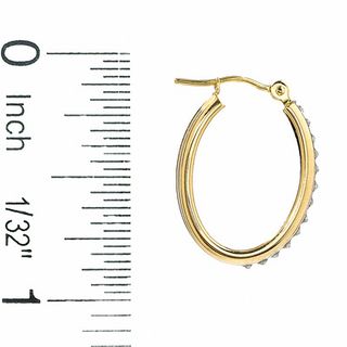 Diamond Fascination™ Medium Ribbed Oval Hoop Earrings in 14K Gold|Peoples Jewellers