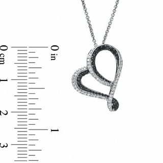 0.20 CT. T.W. Enhanced Black and White Diamond Tilted Heart Pendant in Sterling Silver|Peoples Jewellers