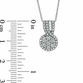 0.49 CT. T.W. Diamond Cluster Swirl Pendant in 10K White Gold|Peoples Jewellers