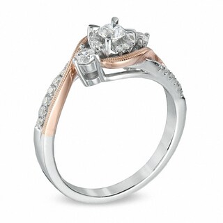 0.50 CT. T.W. Diamond Three Stone Swirl Engagement Ring in 10K Two-Tone Gold|Peoples Jewellers