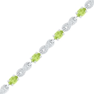 Oval Peridot and 0.10 CT. T.W. Diamond Bracelet in Sterling Silver - 7.5"|Peoples Jewellers