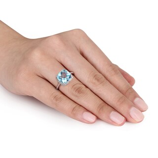 10.0mm Cushion-Cut Blue Topaz and 0.10 CT. T.W. Diamond Frame Ring in 10K White Gold|Peoples Jewellers