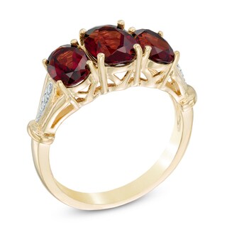 Oval Garnet and Diamond Accent Three Stone Ring in 10K Gold|Peoples Jewellers