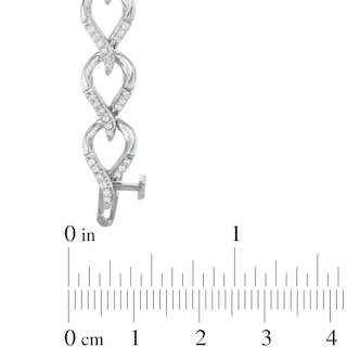 0.95 CT. T.W. Diamond Flame Link Bracelet in 10K White Gold - 7.25"|Peoples Jewellers