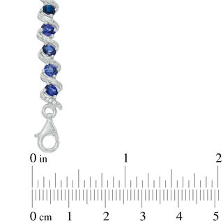 Oval Lab-Created Sapphire and 0.09 CT. T.W. Diamond Cascading Bracelet in Sterling Silver