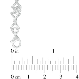 0.18 CT. T.W. Diamond Flower Fashion Link Bracelet in 10K White Gold|Peoples Jewellers