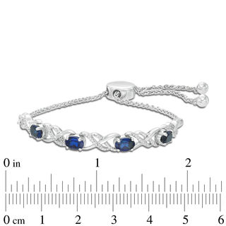 Oval Lab-Created Blue Sapphire and 0.09 CT. T.W. Diamond Infinity Bolo Bracelet in Sterling Silver - 9.5"|Peoples Jewellers