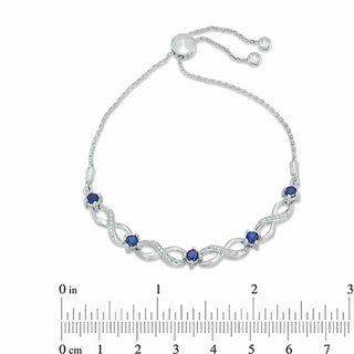 Lab-Created Blue Sapphire and 0.09 CT. T.W. Diamond Five Stone Infinity Bolo Bracelet in Sterling Silver - 9.5"|Peoples Jewellers