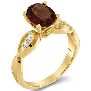 Oval Garnet and 0.11 CT. T.W. Diamond Tri-Sides Ring in 10K Gold|Peoples Jewellers