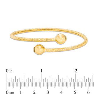 Italian Gold Diamond-Cut Bypass Flex Bangle in 14K Gold - 7.5"|Peoples Jewellers