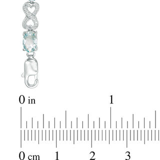 Oval Aquamarine and Diamond Accent Heart-Shaped Infinity Bracelet in Sterling Silver - 7.25"|Peoples Jewellers