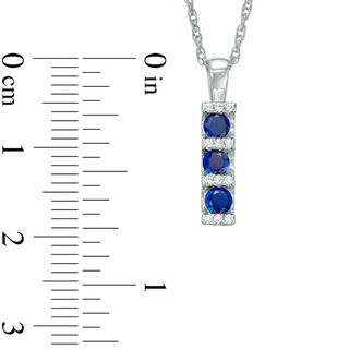 3.0mm Lab-Created Blue Sapphire and Diamond Accent Linear Three Stone Bar Pendant in 10K White Gold|Peoples Jewellers