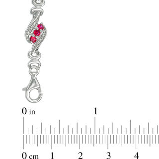 Lab-Created Ruby and 0.23 CT. T.W. Diamond Swirl Three Stone Bracelet in Sterling Silver - 7.5"|Peoples Jewellers
