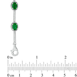 Oval Lab-Created Emerald and 0.23 CT. T.W. Diamond Station Bracelet in Sterling Silver - 7.5"|Peoples Jewellers