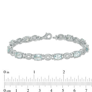 Oval Aquamarine and 0.46 CT. T.W. Diamond "O" Bracelet in Sterling Silver - 7.5"|Peoples Jewellers