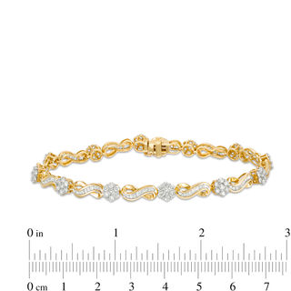 3.00 CT. T.W. Baguette and Round Diamond Alternating Flower and Infinity Bracelet in 10K Gold - 7.5"|Peoples Jewellers