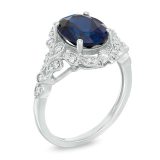 Oval Lab-Created Blue Sapphire and 0.20 CT. T.W. Diamond Vintage-Style Frame Ring in 10K White Gold|Peoples Jewellers