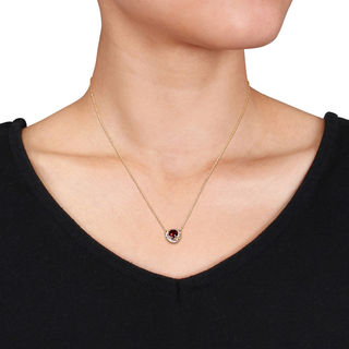 6.0mm Garnet and 0.04 CT. T.W. Diamond Orbit Frame Necklace in 10K Gold - 17"|Peoples Jewellers