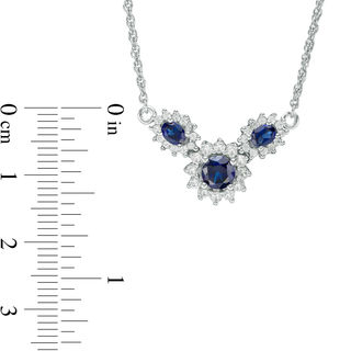 Oval and Round Lab-Created Blue and White Sapphire Sunburst Frame Three Stone Necklace in Sterling Silver|Peoples Jewellers
