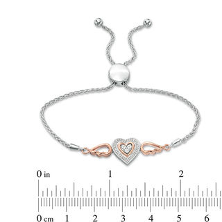 0.066 CT. T. W. Composite Diamond Double Heart Winged Bolo Bracelet in Sterling Silver and 10K Rose Gold - 9.5"|Peoples Jewellers