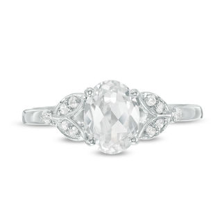Oval Lab-Created White Sapphire and 0.086 CT. T.W. Diamond Leaf Sides Ring in Sterling Silver|Peoples Jewellers