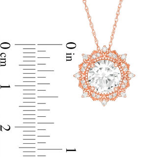 8.0mm Lab-Created White Sapphire and 0.145 CT. T.W. Diamond Sunburst Frame Vintage-Style Pendant in 10K Rose Gold|Peoples Jewellers