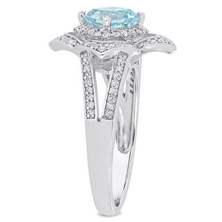 6.0mm Cushion-Cut Blue Topaz and 0.19 CT. T.W. Diamond Flower Frame Split Shank Ring in Sterling Silver|Peoples Jewellers
