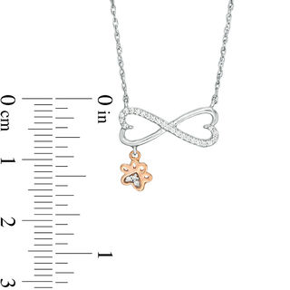 0.067 CT. T.W. Diamond Sideways Heart Infinity with Paw Print Dangle Necklace in Sterling Silver and 10K Rose Gold|Peoples Jewellers