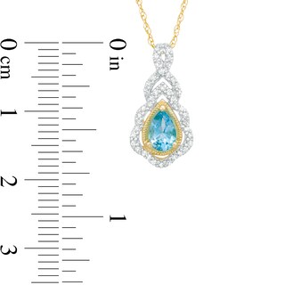 Pear-Shaped Swiss Blue Topaz and 0.15 CT. T.W. Diamond Scallop Frame Ornate Pendant in 10K Gold|Peoples Jewellers