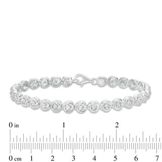 0.086 CT. T.W. Diamond Love Knot Tennis Bracelet in Sterling Silver - 7.5"|Peoples Jewellers