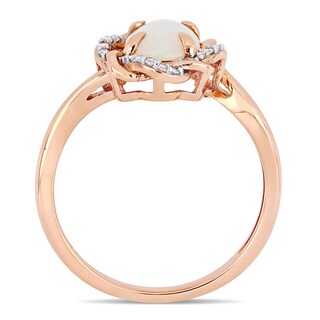 Oval Opal and 0.08 CT. T.W. Diamond Twist Frame Ring in 10K Rose Gold|Peoples Jewellers