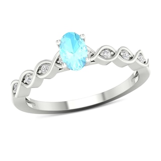 Oval Aquamarine and 0.07 CT. T.W. Diamond Cascading Ribbon Shank Ring in 10K White Gold|Peoples Jewellers
