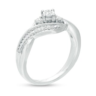 0.09 CT. T.W. Diamond Three Stone Twist Shank Promise Ring in Sterling Silver|Peoples Jewellers