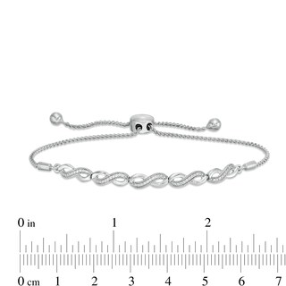 0.09 CT. T.W. Diamond Vintage-Style Infinity Bolo Bracelet in Sterling Silver - 9.5"|Peoples Jewellers