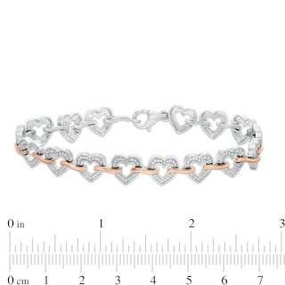 0.10 CT. T.W. Diamond Hearts Bracelet in Sterling Silver and 10K Rose Gold - 7.5"|Peoples Jewellers