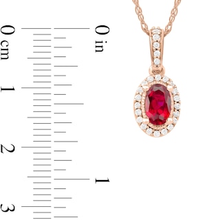 Oval Ruby and 0.06 CT. T.W. Diamond Framed Vintage-Style Drop Pendant in 10K Rose Gold|Peoples Jewellers