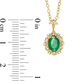 Oval Emerald and 0.05 CT. T.W. Diamond Scallop Frame Floral Drop Pendant in 10K Gold|Peoples Jewellers