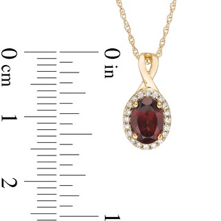 Oval Garnet and 0.08 CT. T.W. Diamond Frame Twisted Split Bail Pendant in 10K Gold|Peoples Jewellers