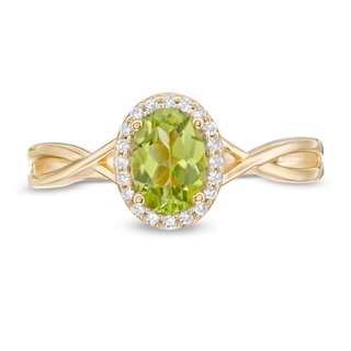 Oval Peridot and 0.08 CT. T.W. Diamond Frame Twist Shank Ring in 10K Gold|Peoples Jewellers
