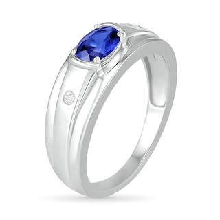 Men's Oval Blue Lab-Created Sapphire and 0.04 CT. T.W. Diamond Duo Stepped Edge Ring in Sterling Silver|Peoples Jewellers