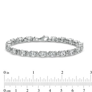 5.0mm White Lab-Created Sapphire and 0.04 CT. T.W. Diamond Oval Frame Line Bracelet in Sterling Silver - 7.5"|Peoples Jewellers
