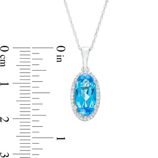 Oval Swiss Blue Topaz and 0.10 CT. T.W. Diamond Frame Pendant in 10K White Gold|Peoples Jewellers