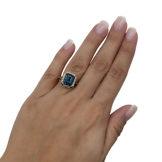 Le Vian® Emerald-Cut Deep Sea Blue Topaz™ and 0.30 CT. T.W. Diamond Octagon Frame Ring in 14K Strawberry Gold®|Peoples Jewellers