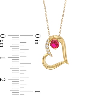 Lab-Created Ruby and 0.04 CT. T.W. Diamond Tilted Heart Pendant in 10K Gold|Peoples Jewellers