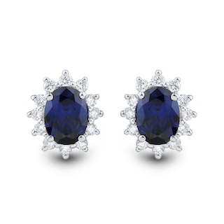 Oval Blue Lab-Created Sapphire and 0.45 CT. T.W. Certified Lab-Created Diamond Sunburst Stud Earrings in 10K White Gold|Peoples Jewellers