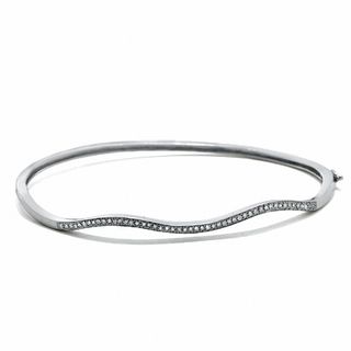 Previously Owned - 0.15 CT. T.W. Diamond Wavy Bangle in Sterling Silver|Peoples Jewellers