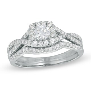 Previously Owned - 0.70 CT. T.W. Diamond Twist Shank Bridal Set in 14K White Gold (I/I1)|Peoples Jewellers