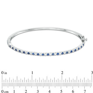 Previously Owned - Alternating Lab-Created Blue and White Sapphire Bangle in Sterling Silver|Peoples Jewellers