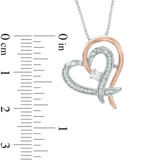Previously Owned - 0.18 CT. T.W.   Diamond Heart Pendant in Sterling Silver and 10K Rose Gold (I/I2)|Peoples Jewellers