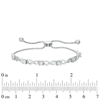 Previously Owned - 0.16 CT. T.W. Diamond Infinity Bolo Bracelet in 10K White Gold - 9.5"|Peoples Jewellers